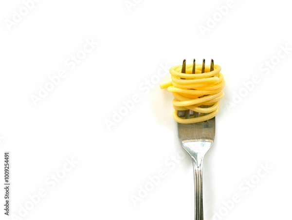 Fototapeta Cooked capellini spaghetti with fork