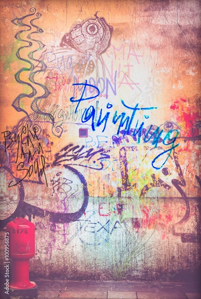 Fototapeta Wall with script and graffiti