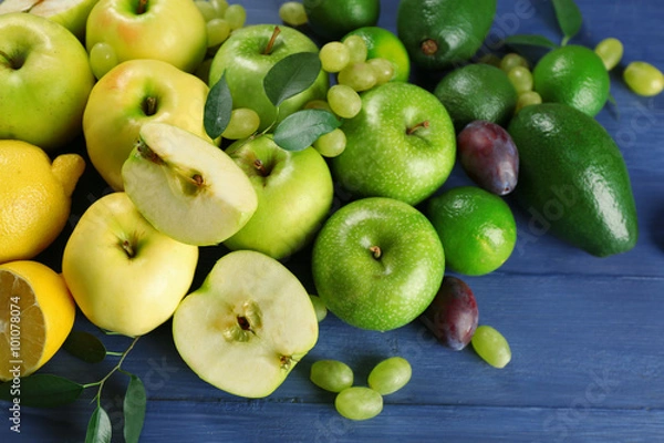 Obraz Fruits on dark blue wooden background