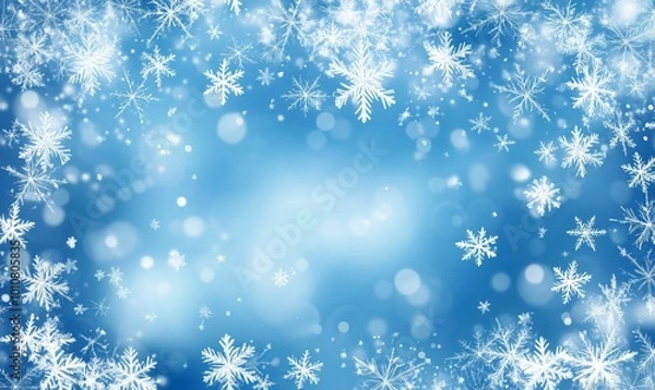 Obraz A blue background with snowflakes falling on it