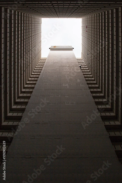 Fototapeta Hong Kong, China - Landscape of buildings against the sky taken from directly below