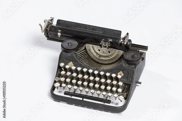 Fototapeta Old typewriter, blank sheet in a typewriter.