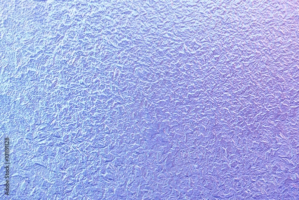 Fototapeta Frost patterns on window glass in winter. Frosted Glass Texture. Blue Purple