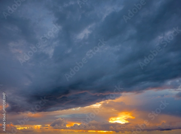 Fototapeta Sunset cloudy sky background overlay. Ideal for sky replacement