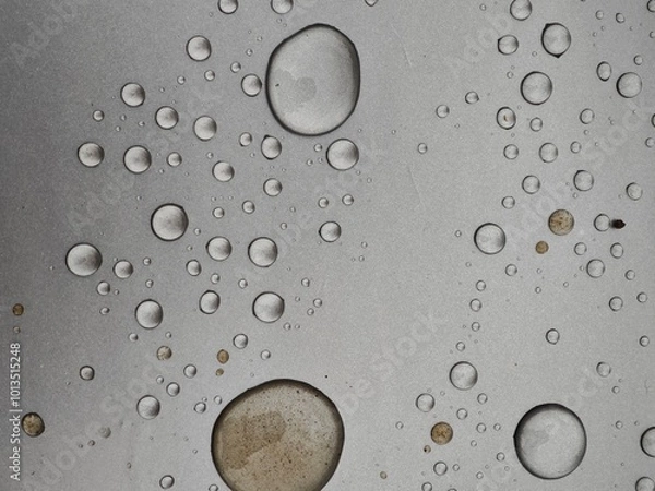 Obraz water drops on metal surface