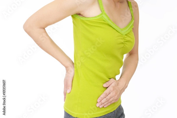 Fototapeta 腹痛を訴える女性