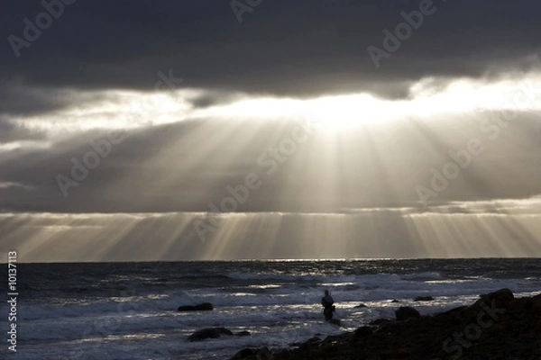 Obraz Fishing in the Sun Rays