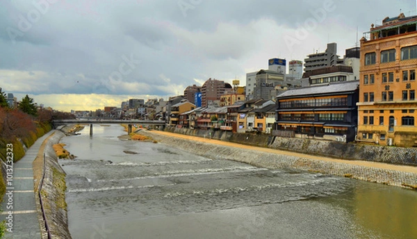Obraz The Kamo River (鴨川, Kamo-gawa, duck river) is located in Kyoto, Japan. The Kamo River has its source in the mountains in the area of Mount Sajikigatake. 