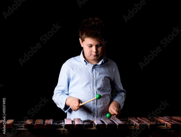 Obraz Boy playing on xylophone