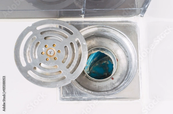 Fototapeta unequal sewer floow drain from mistake in construction.