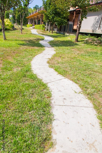 Fototapeta Beautiful walking way garden 

