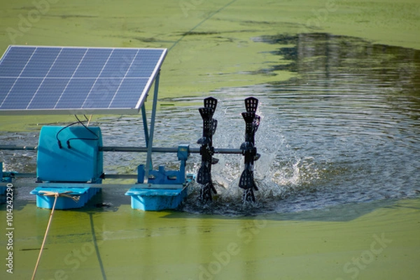 Fototapeta Wastewater treatment using water turbine powered by solar panel