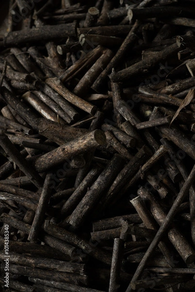 Fototapeta Close of pile of wood preparing for firewood in vertical