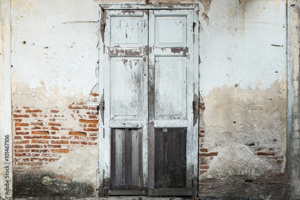 Obraz Single Wooden Door in Old home Wall