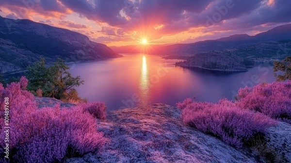 Fototapeta Scenic view of a sunset over a lake, captured from a distance, highlighting the colors and beauty of the landscape 