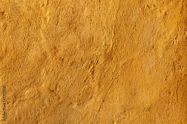 Fototapeta Yellow stucco wall. Background texture