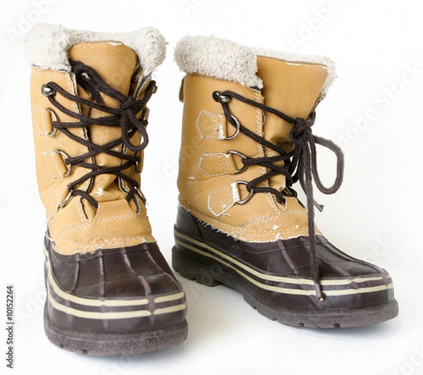 Fototapeta Snow boots isolated on white background.