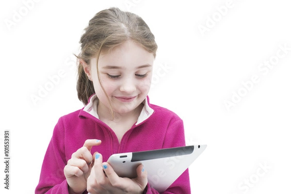 Obraz Bambina mentre consulta un tablet