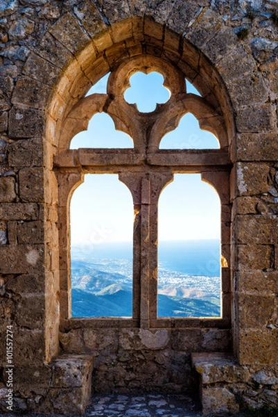 Fototapeta Gothic window with a mountain view
