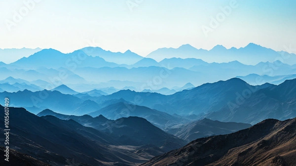 Fototapeta A panoramic view of a vast mountain range stretching across the horizon.