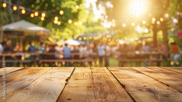 Fototapeta Wooden Table with a Blurred Background of a Summer Party
