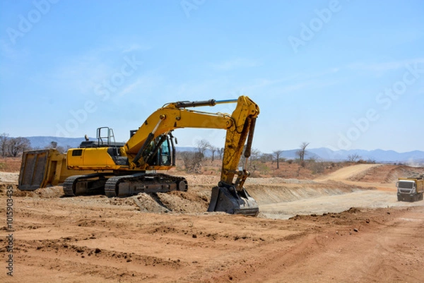 Obraz Excavator Working on Road Construction