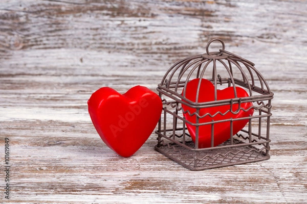 Obraz Valentine's day background with one heart in cage
