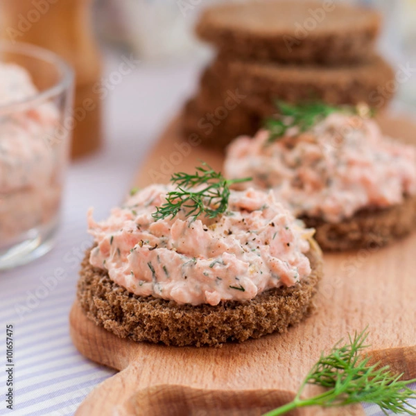 Fototapeta Smoked Salmon, Cream Cheese, Dill and Horseradish Pate on Rye Br