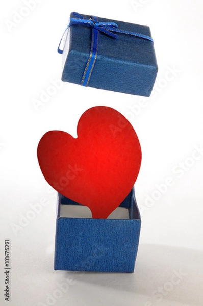 Obraz Red Hearth opening a blue gift box
