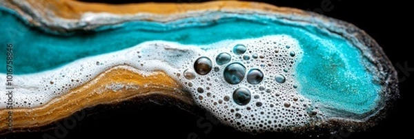 Obraz  A tight shot of an artpiece depicting a wave of water, adorned with bubbles