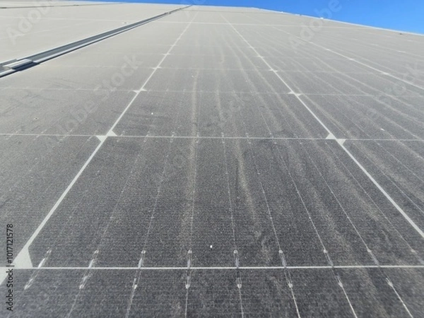 Fototapeta PV modules with dust on it needs to be cleaned, desert areas got sand storms during the seasons and year repeatedly which covers the module and prevent energy generation in the cells
