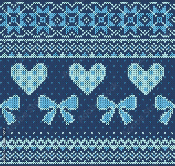 Fototapeta Seamless pattern on the theme of Valentine's Day with an image of the Norwegian patterns and hearts. Wool knitted texture