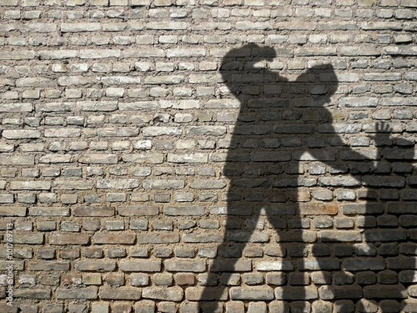 Fototapeta Shadow of Men in Fight