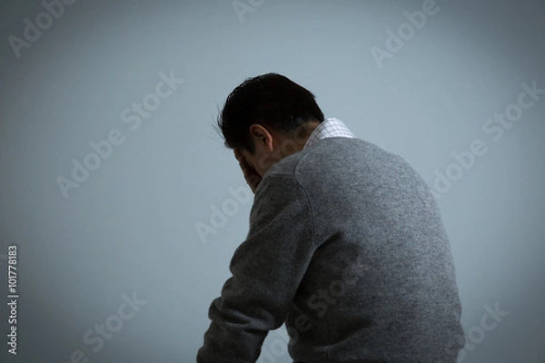 Obraz 落込む中高年男性