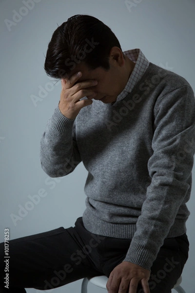 Obraz 落込む中高年男性