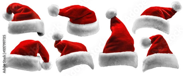 Fototapeta Set of isolated red Santa Claus hats. Collection of bright contrasting hats