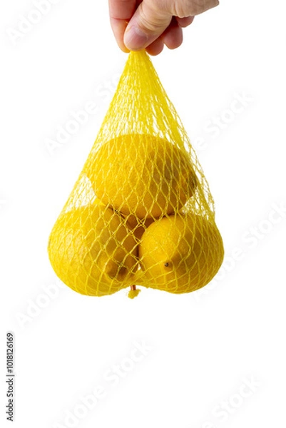 Obraz Lemons in a plastic net 