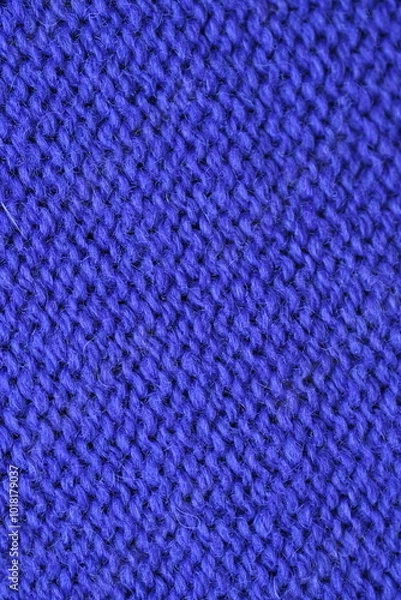 Fototapeta Macro texture of purple wool crochet sweater as background, close-up of purple crochet front surface, texture of woolen wool, crochet front surface