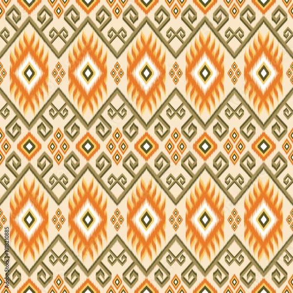 Fototapeta A traditional ikat pattern in warm earthy tones of orange, brown, and beige. Featuring geometric diamond shapes and intricate motifs, perfect for fabric, home decor, and ethnic-inspired design project