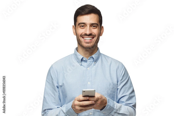 Fototapeta Portrait of positive businessman laughing out loud while using mobile phone