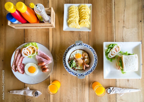 Fototapeta Delicious breakfast for two in the morning. top view