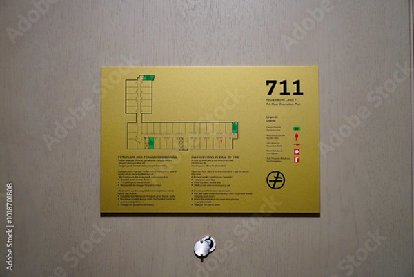 Obraz Hotel room evacuation plan on wall