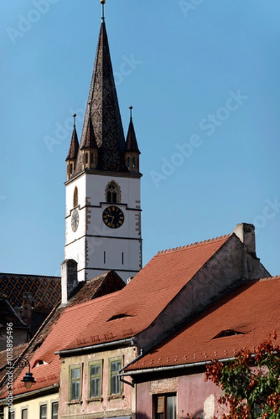 Fototapeta Fragment from the clock tower of Lutheran Cathedral of Saint Mary. It is a prominent landmark in Sibiu, Romania, one of the largest Gothic-style churches in Transylvania. 