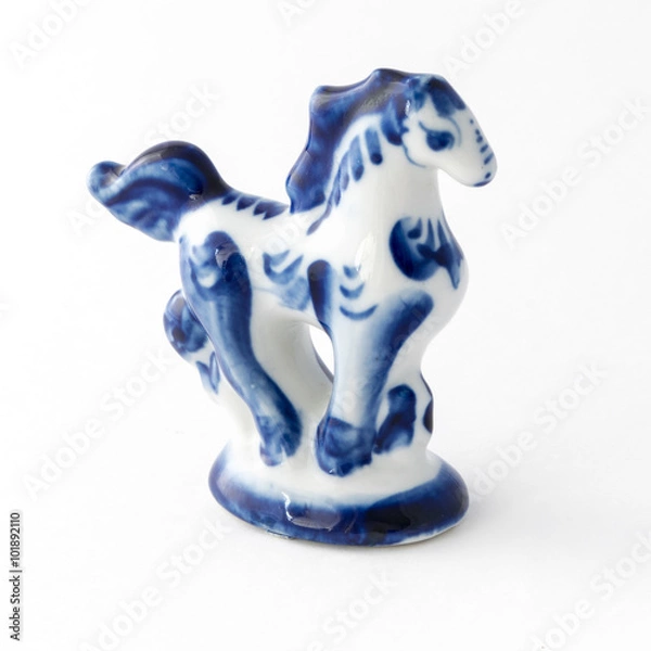 Fototapeta The horse. Figurine of a symbol of the year in gzhel style.