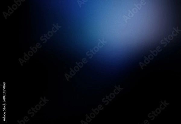Fototapeta A grainy, blue and black abstract gradient background design.