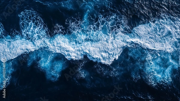 Obraz Aerial View of Ocean Waves: A top-down view of ocean waves, highlighting the patterns and movement of the sea from above.