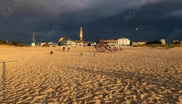 Obraz Strand Warnemünde mit Leuchtturm an der Ostsee