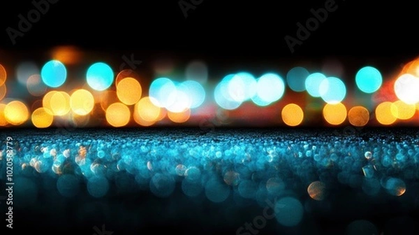 Fototapeta Soft glowing blue circles create an enchanting bokeh effect against a dark background, evoking a magical nighttime ambiance
