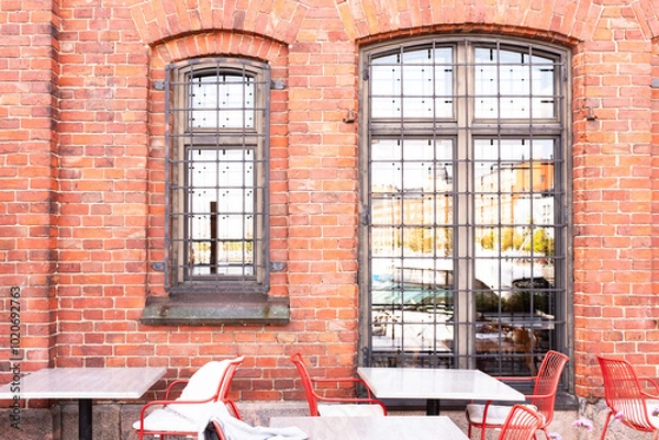 Fototapeta red brick wall with windows