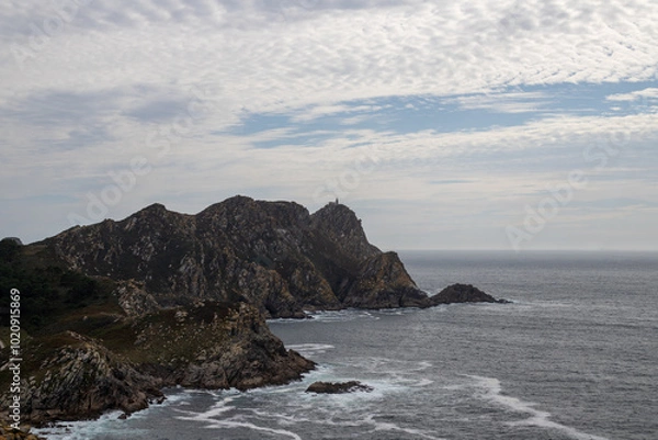 Obraz Image Description: Dramatic coastal landscape with rugged cliffs, crashing waves, and a cloudy sky. Perfect for projects related to nature, travel, or adventure.